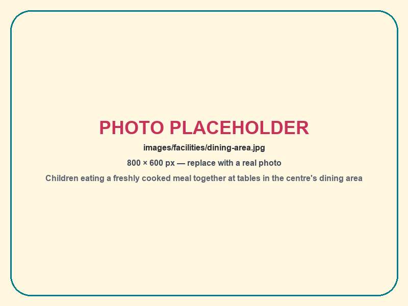 Children eating a freshly cooked meal together at tables in the centre's dining area